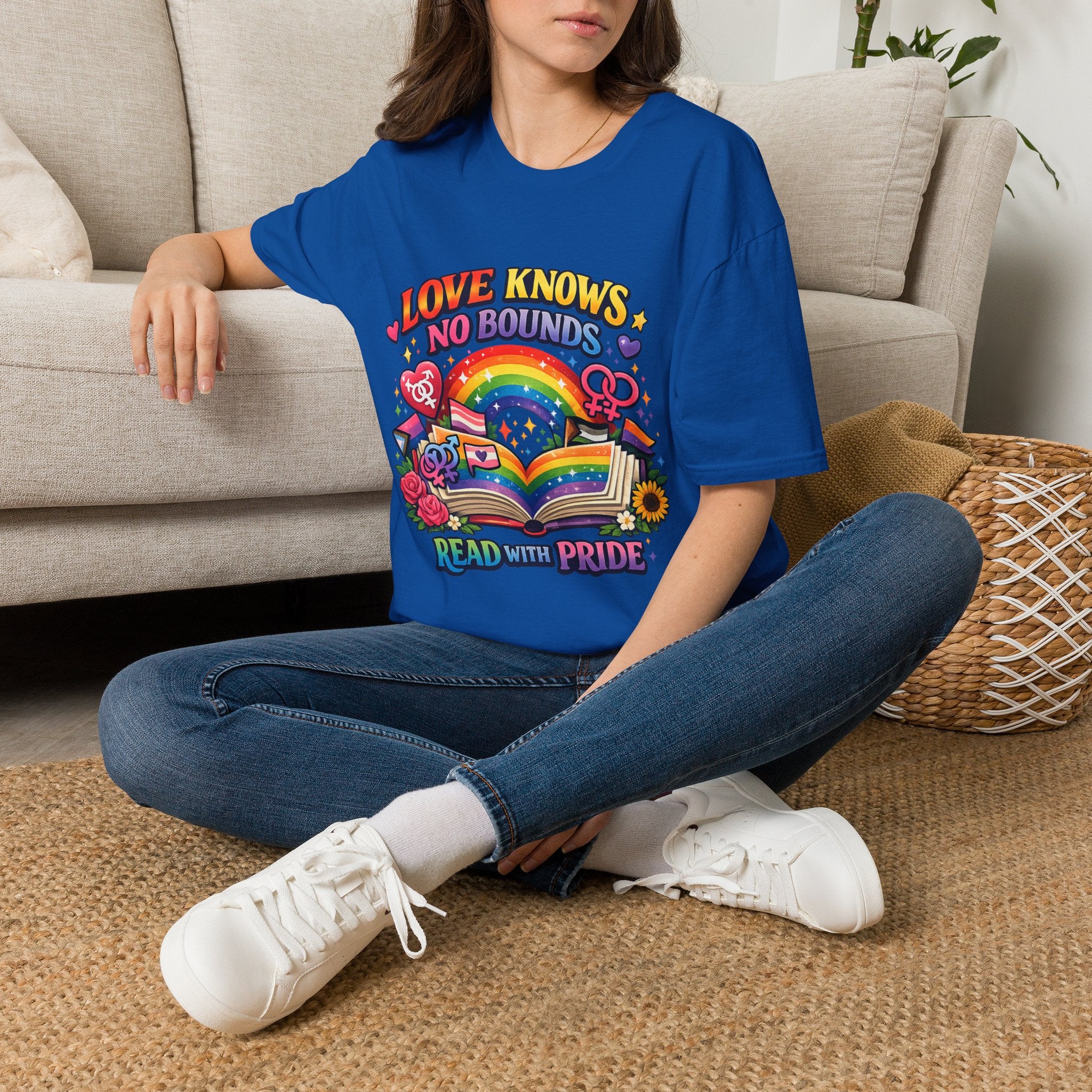 LGBTQ+ book lover tee with rainbow book, pride symbols, and "Love Knows No Bounds, Read With Pride" text.