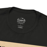 Close-up of a black short-sleeve t-shirt showing the inner neck label with the white printed &