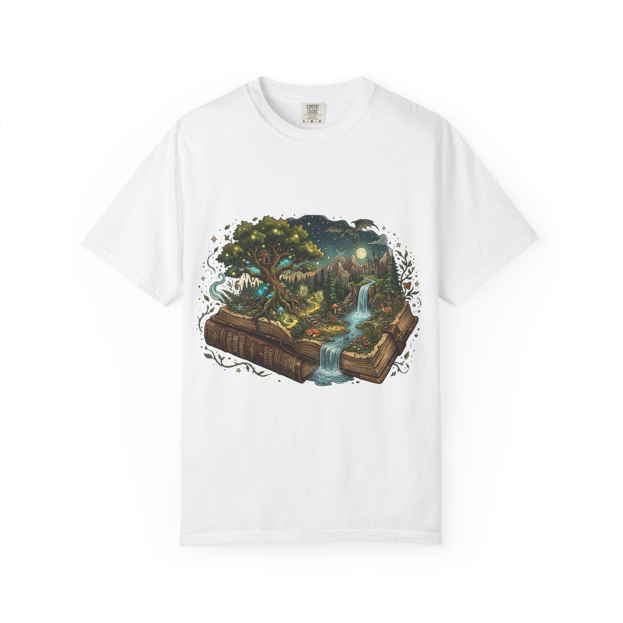 Fantasy book lover tee featuring an enchanted forest, waterfall, and castle emerging from an open book.