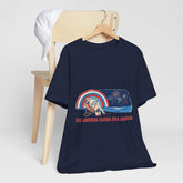 Navy blue t-shirt with graphic design on a wooden chair against a white background