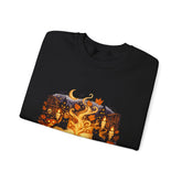 A folded black crewneck t-shirt with a detailed graphic print on the front depicting a spooky autumn night scene with a crescent moon, haunted houses, jack-o&