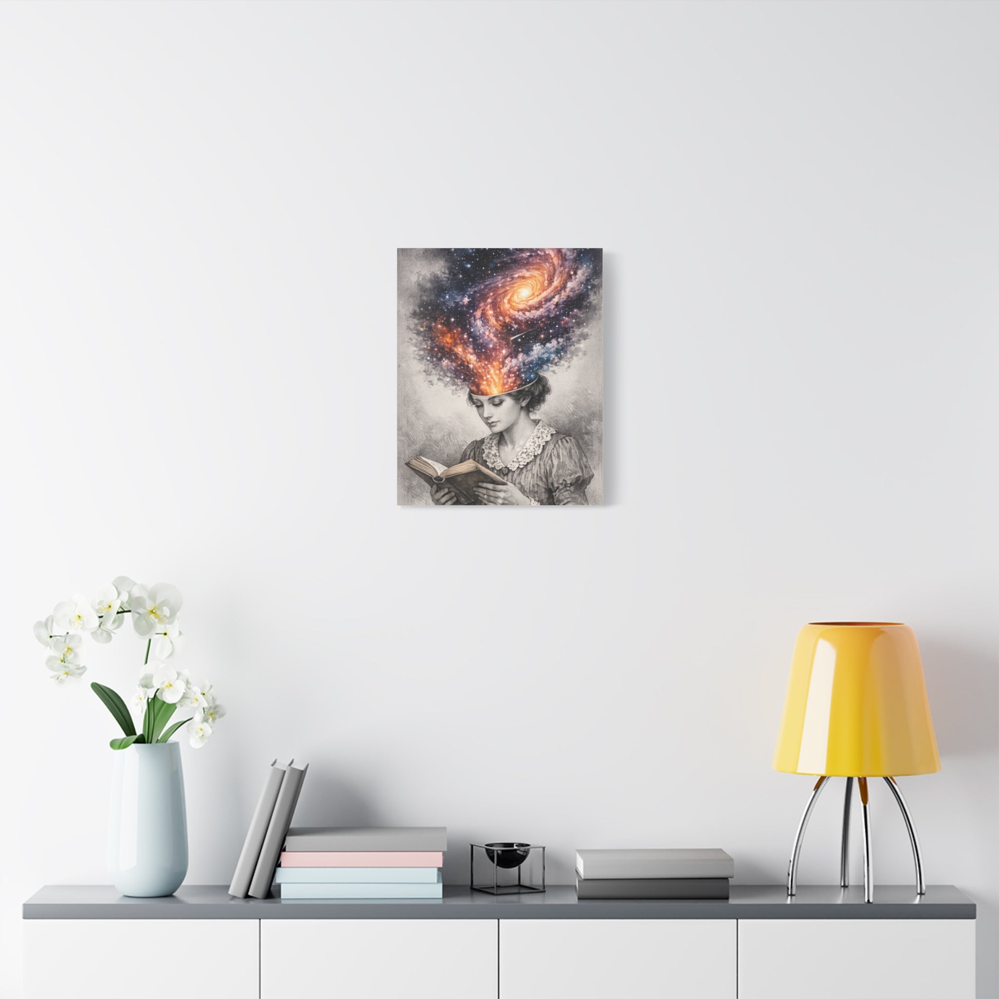 Canvas art of a vintage reader with a glowing galaxy and stars swirling from her mind above an open book.