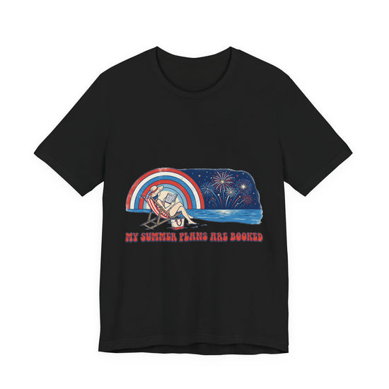 Black t-shirt with a graphic design of a beach scene, rainbow, and text on a white background