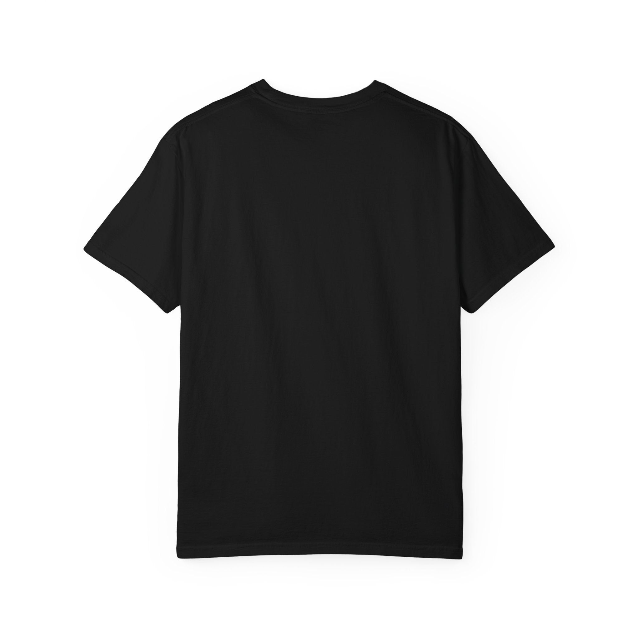 Fantasy book lover tee featuring an enchanted forest, waterfall, and castle emerging from an open book.