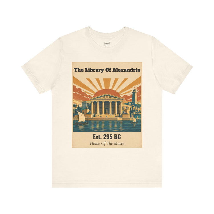 An off-white crewneck t-shirt featuring a vintage-style graphic print of the Library of Alexandria with a classical temple, sailboats, and a sunset.