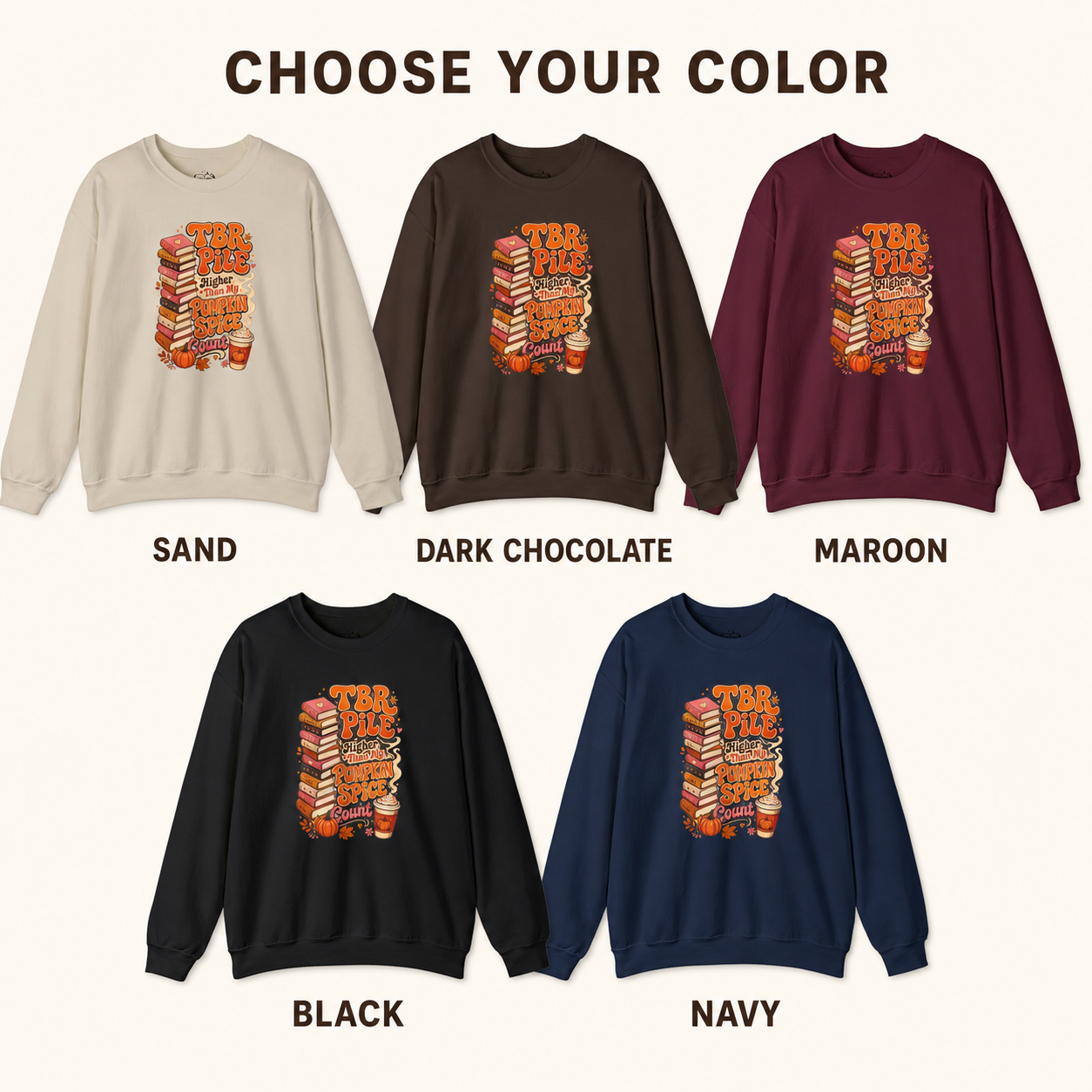 A color selection graphic showing five crewneck sweatshirts labeled SAND, DARK CHOCOLATE, MAROON, BLACK, and NAVY, each with a stack-of-books graphic on the chest under the heading &