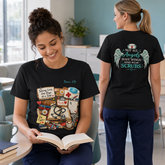 Two women modeling a black graphic T-shirt in a bright indoor setting. The front view shows a colorful medical-themed print with books, a stethoscope, a heart monitor, and small text reading &