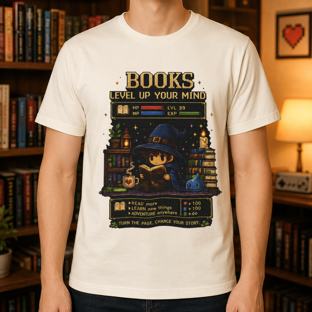 A person wearing a cream-colored graphic t-shirt with a retro video game style book-themed design, standing in front of a warm, book-filled background.