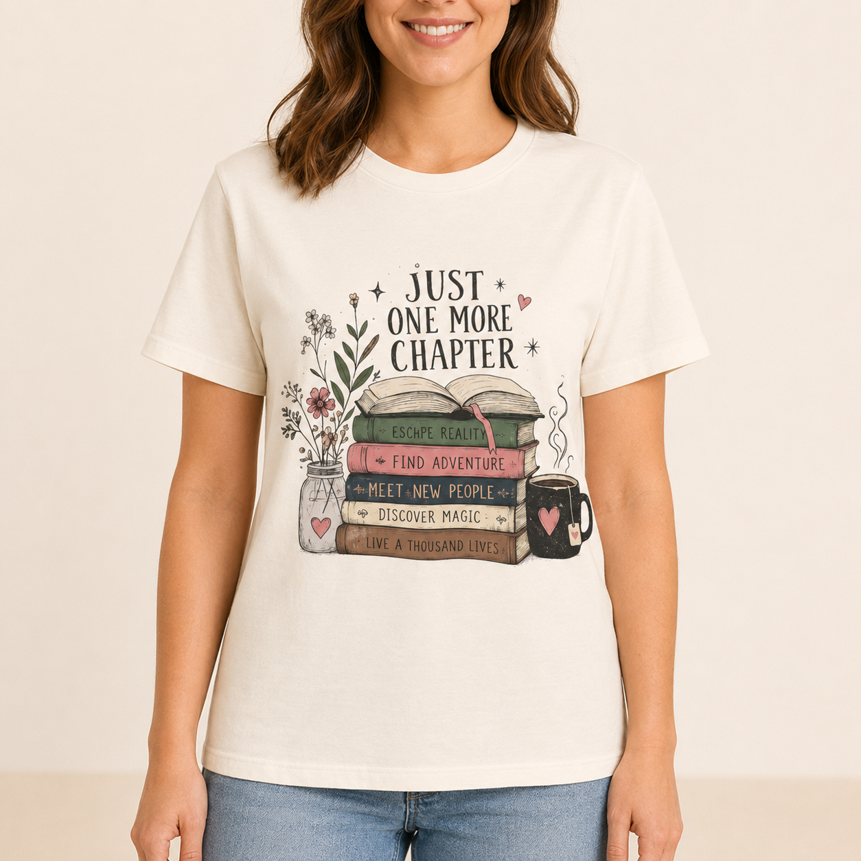 A woman wearing a cream-colored graphic t-shirt with a book-themed print that reads &