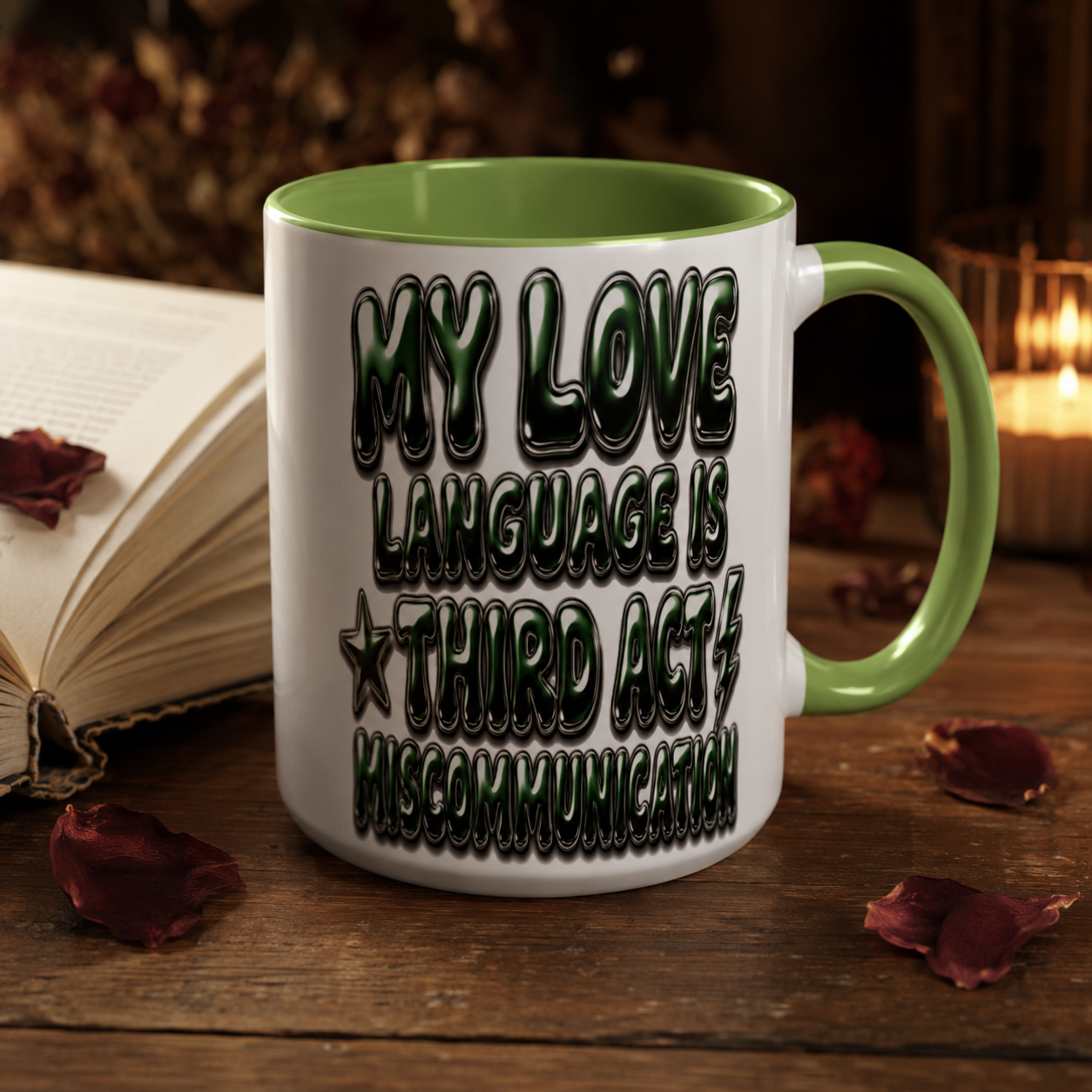A white ceramic mug with a light green handle and interior, featuring the text &