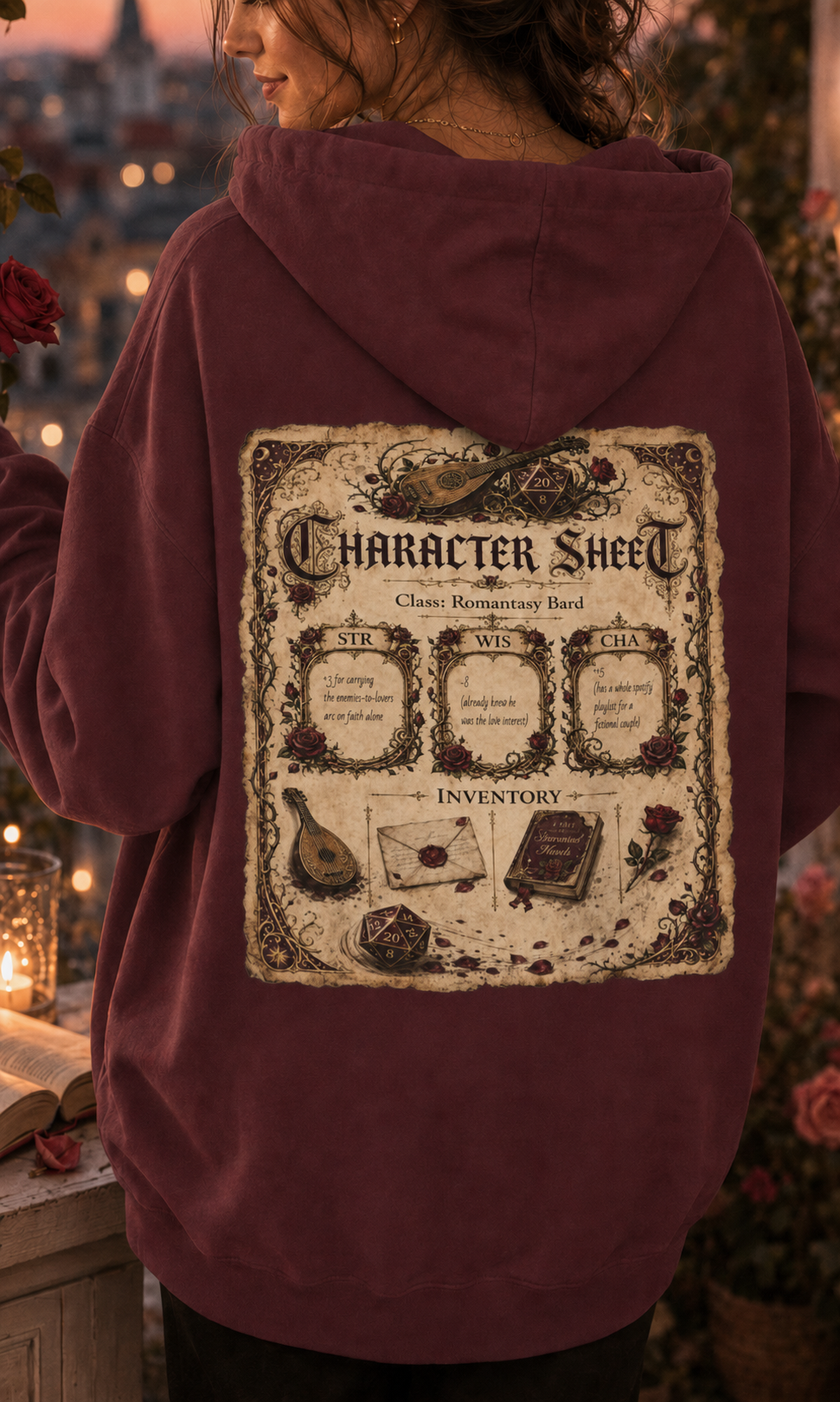 A person wearing a burgundy hooded sweatshirt, shown from the back. The hoodie features a large vintage-style &