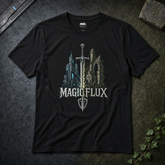 A black short-sleeve t-shirt laid flat on a dark textured surface, featuring a fantasy graphic of a sword piercing a cityscape with the text &