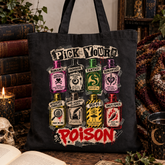 A black canvas tote bag with a colorful graphic print of six potion bottles and the words &