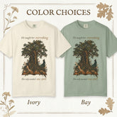 Color options display for a graphic t-shirt featuring an illustration of an old tree with a bird and the text &