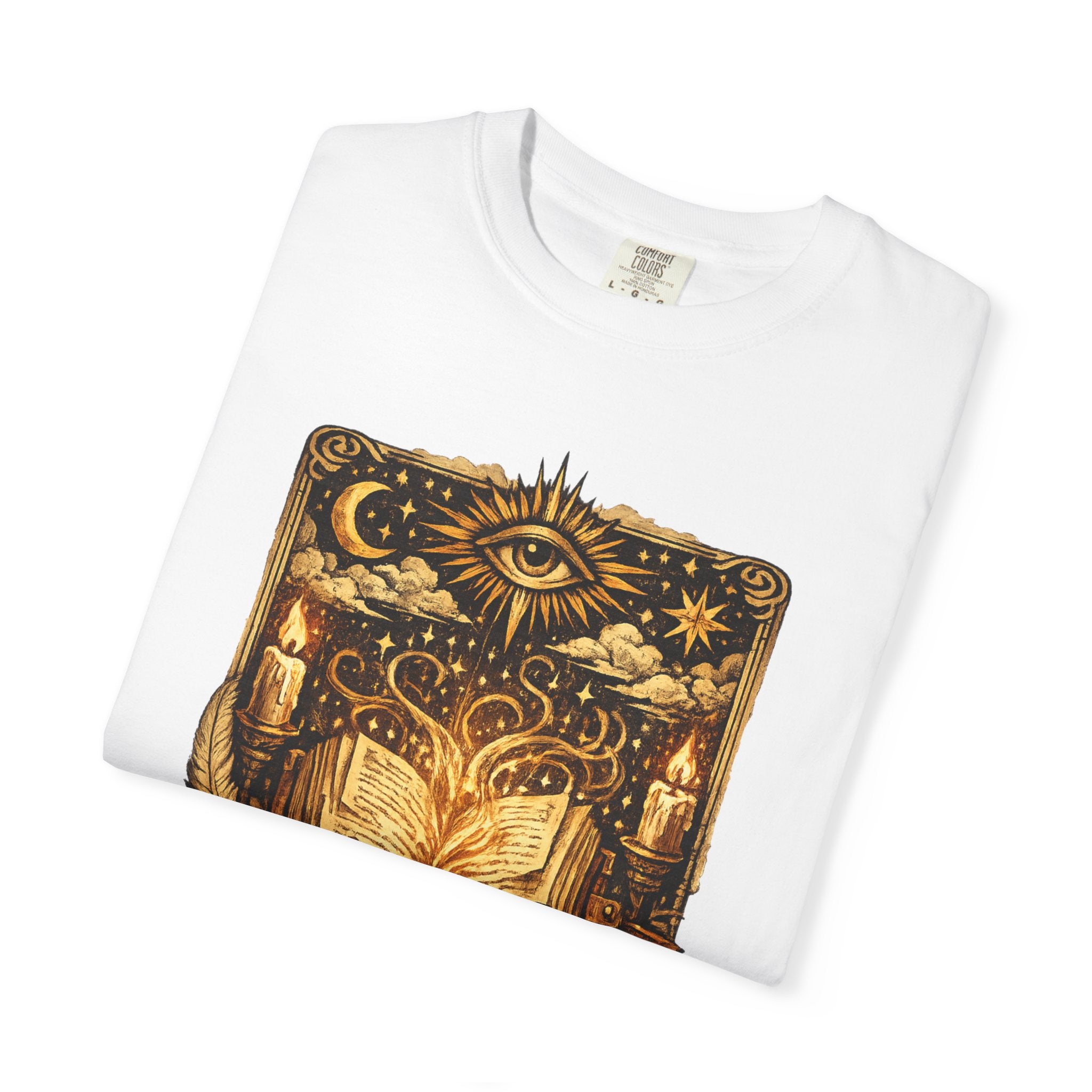 White t-shirt with a gold and black mystical design on a white background
