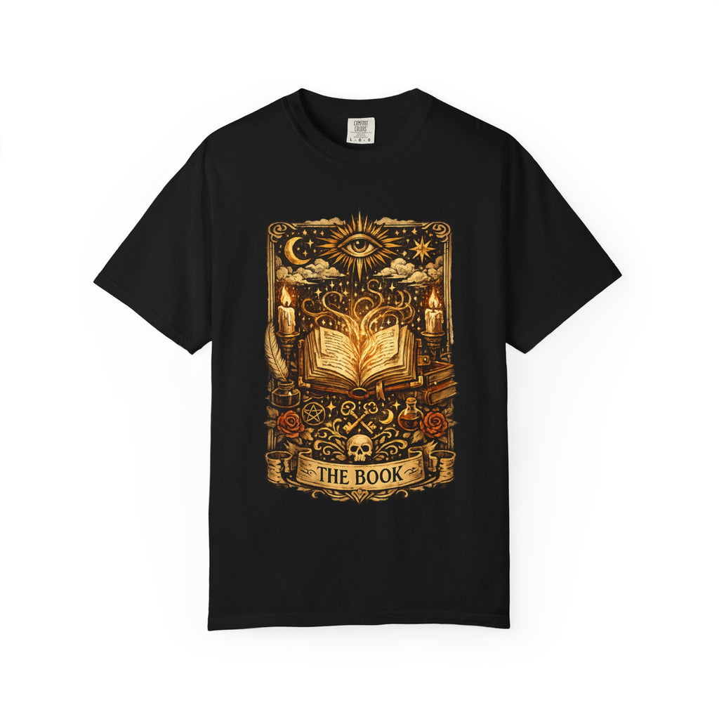 Black t-shirt with gold graphic design featuring an open book and various symbols on a white background.