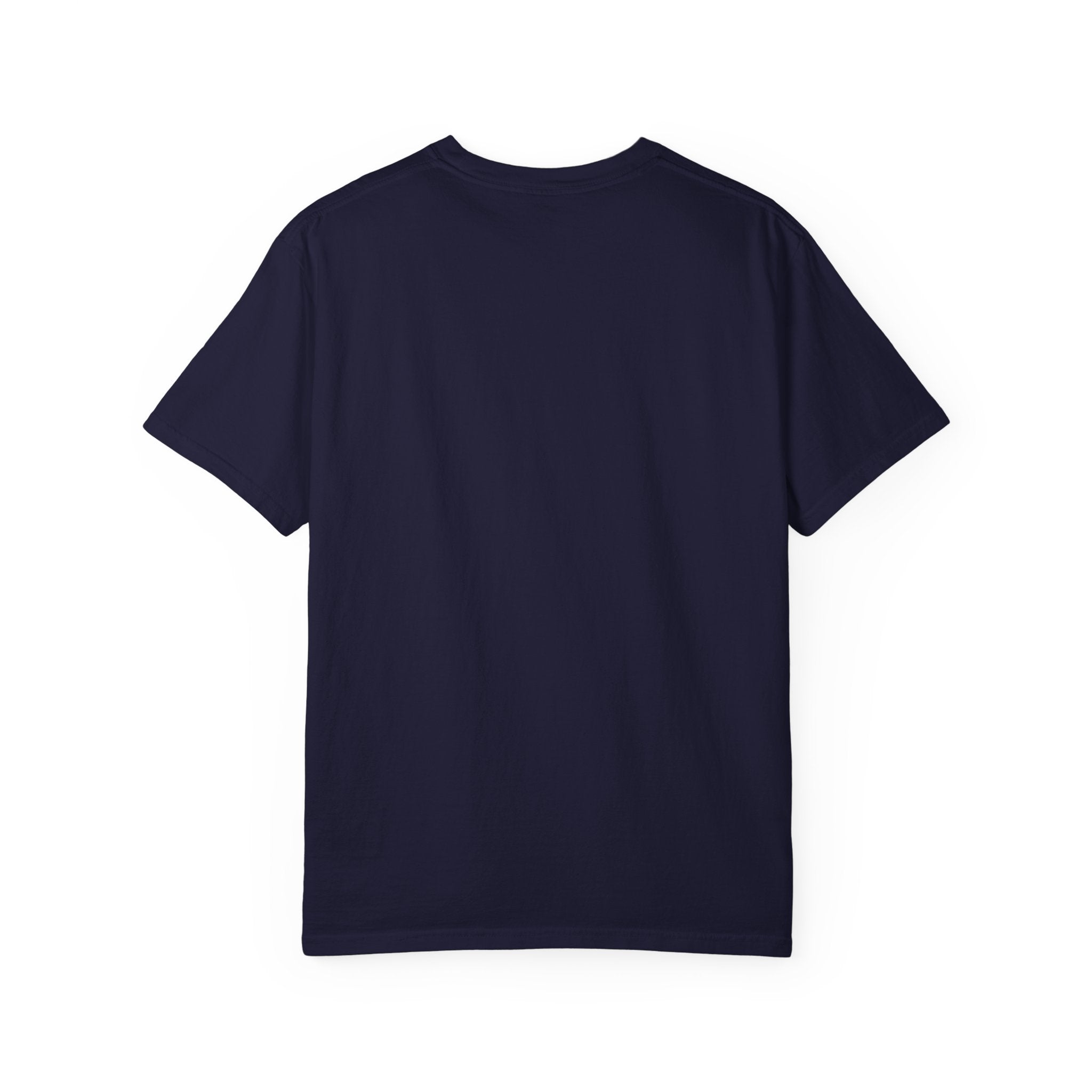 Fantasy book lover tee featuring an enchanted forest, waterfall, and castle emerging from an open book.