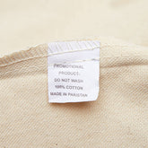 Label on a beige fabric product indicating &