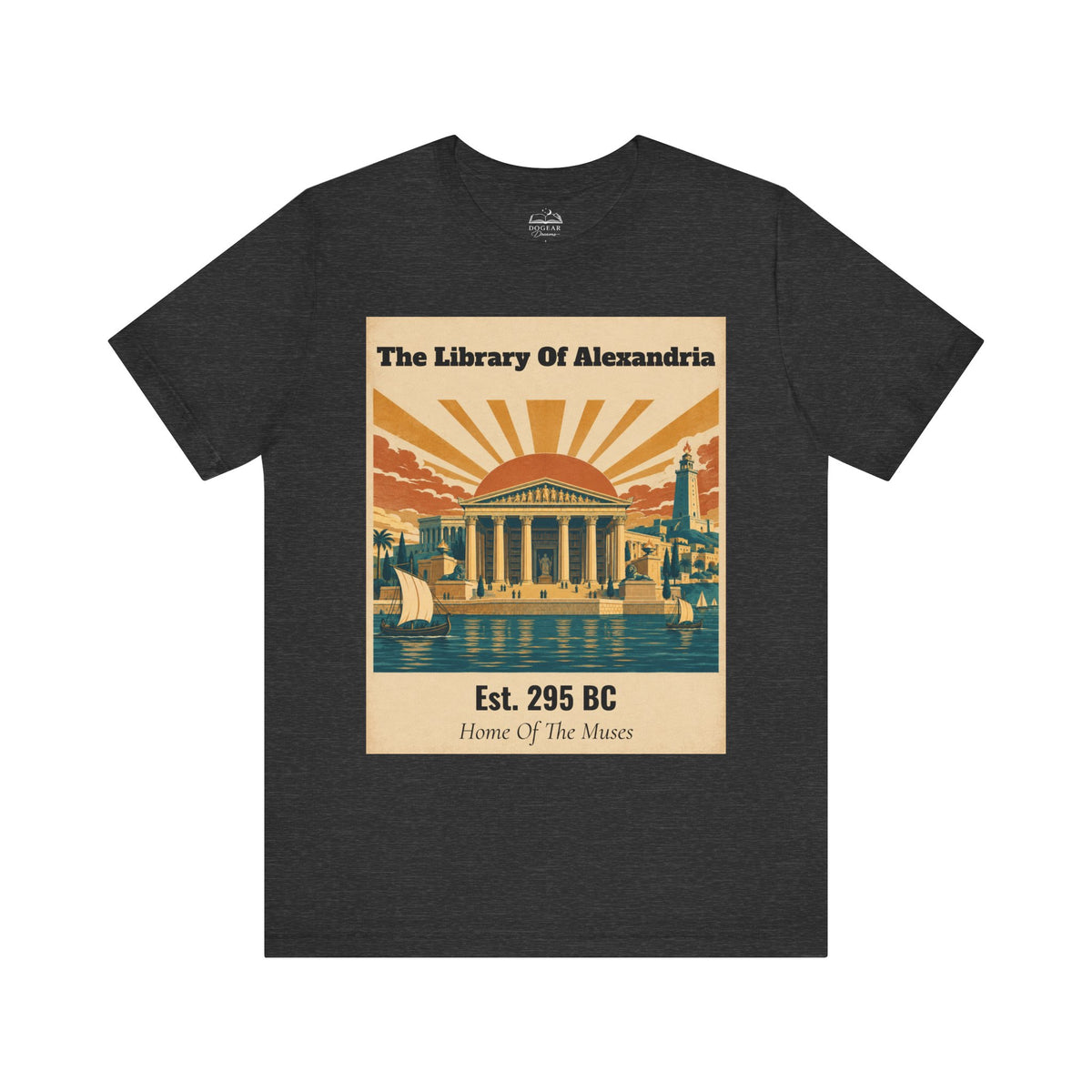 A dark heather gray t-shirt with a vintage-style graphic print on the front. The graphic features a beige background with retro illustrations of the Library of Alexandria, including columns, a sunburst, sailboats, and a lighthouse, with text reading &