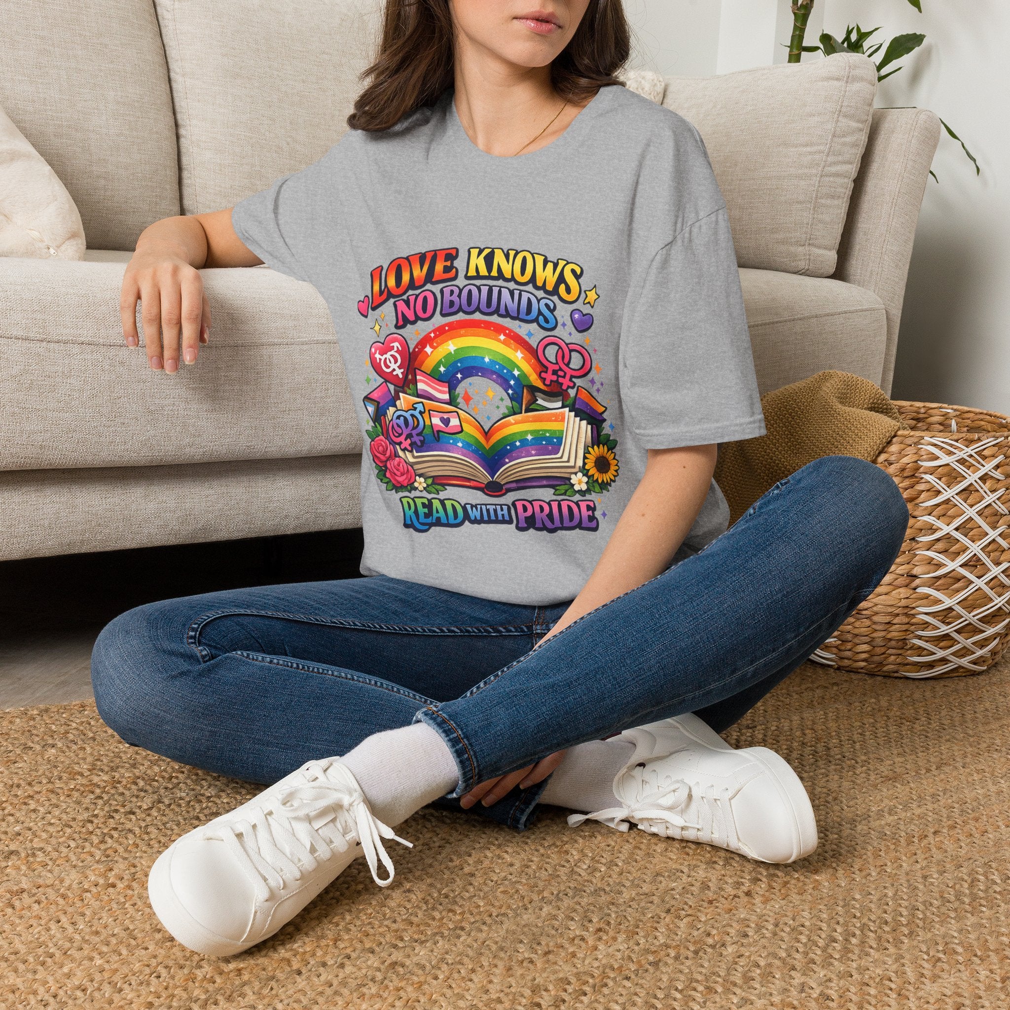 LGBTQ+ book lover tee with rainbow book, pride symbols, and "Love Knows No Bounds, Read With Pride" text.