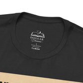 Close-up of a black short-sleeve t-shirt showing the inner neck label with a white printed logo that reads &
