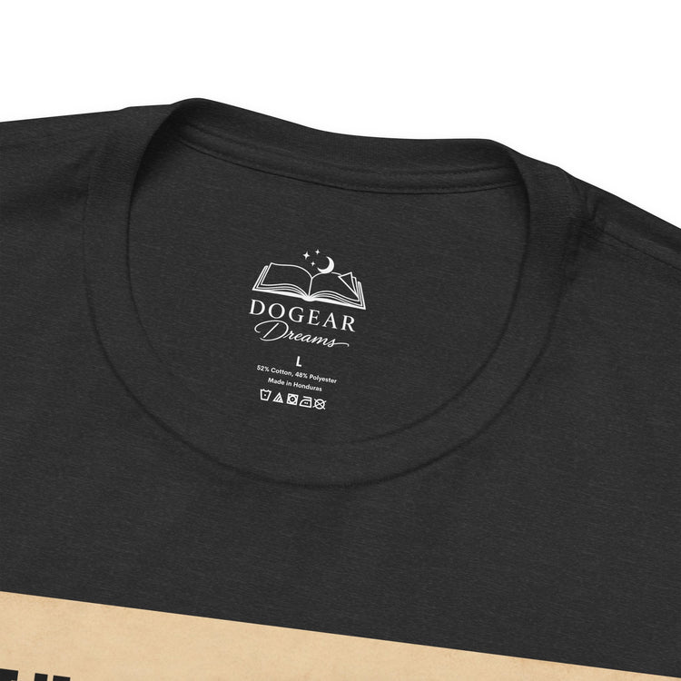 Close-up of a black short-sleeve t-shirt showing the inner neck label with a white printed logo that reads &