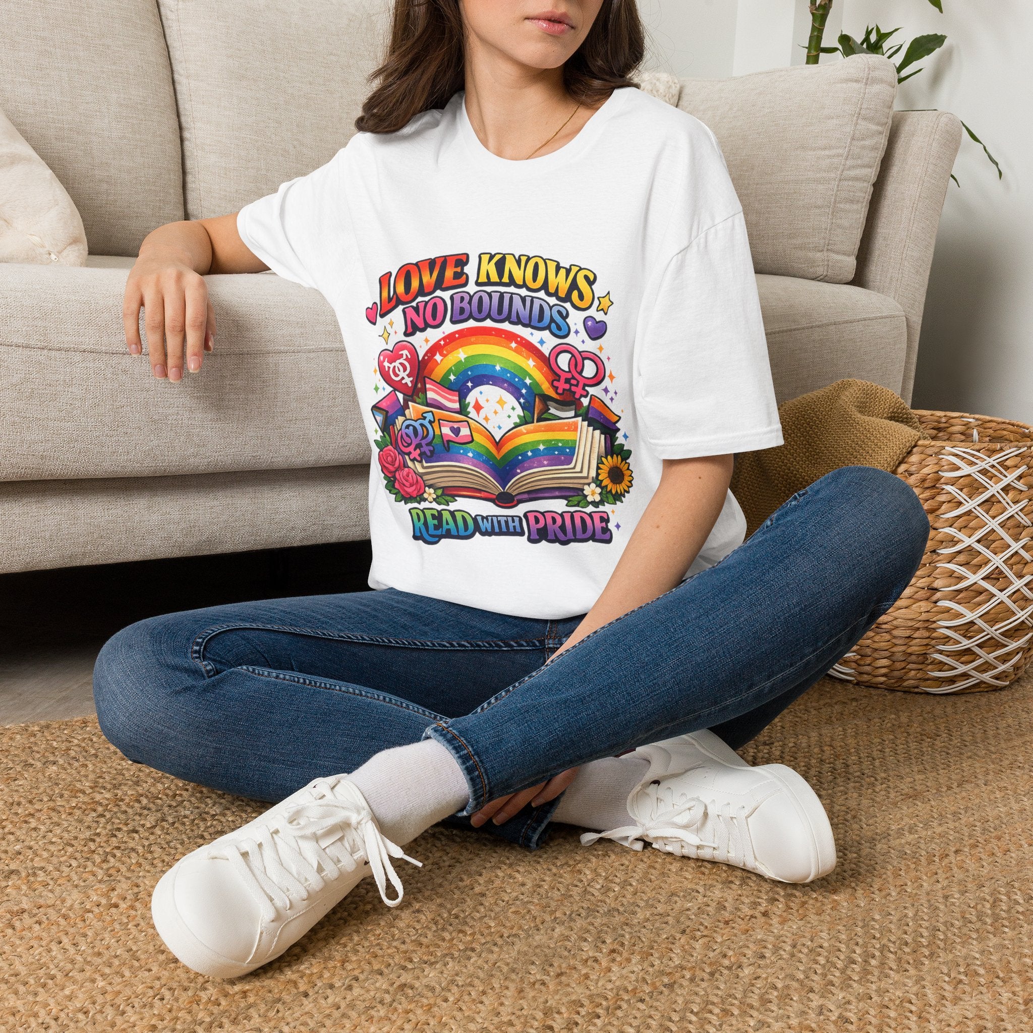 LGBTQ+ book lover tee with rainbow book, pride symbols, and "Love Knows No Bounds, Read With Pride" text.