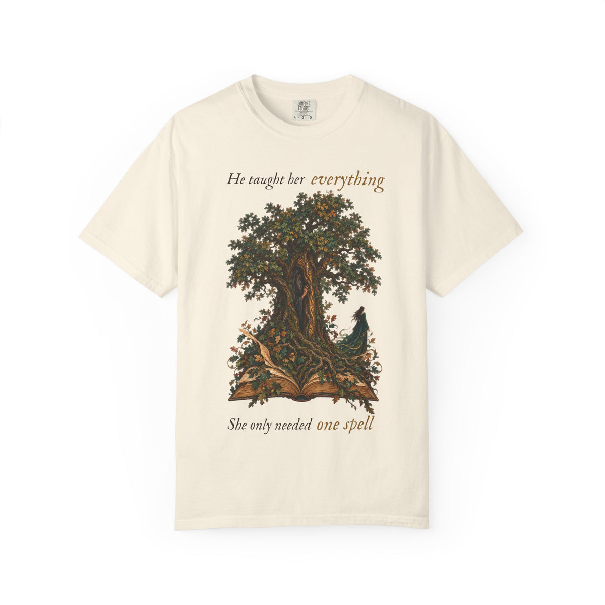 An off-white short-sleeve t-shirt with a graphic of a tree growing from an open book, accompanied by a peacock. The text reads &